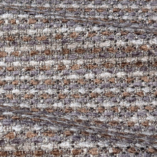 Close-up of a textured fabric with brown, gray, and white colors.